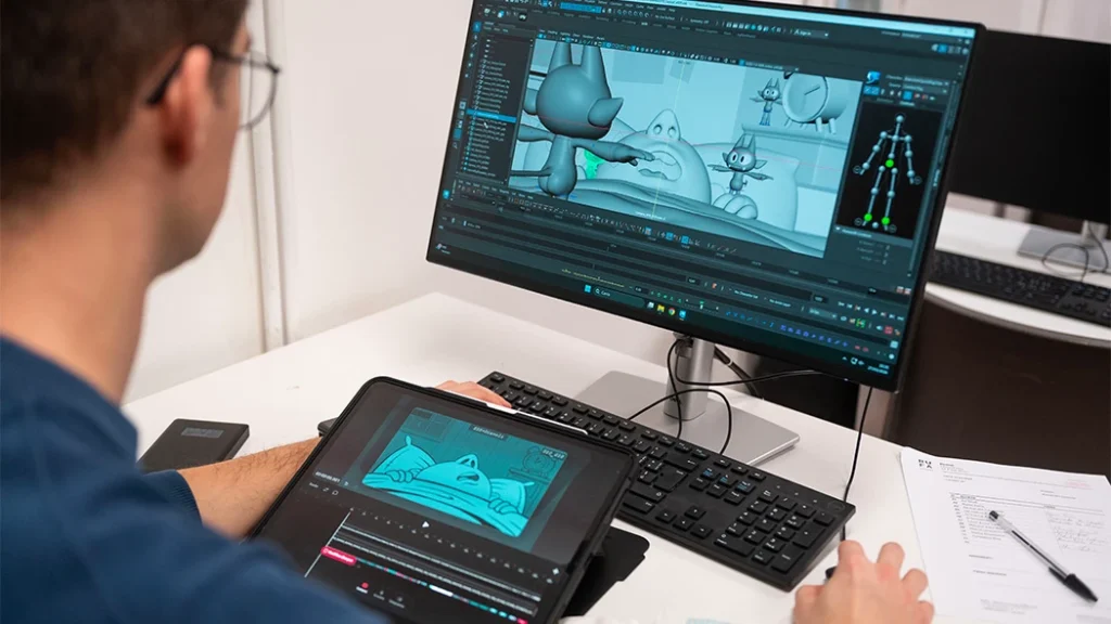 alessandro contenta fa delle animazioni 3d al computer.